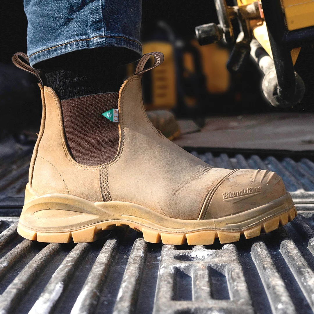 Blunstone work and safety boots being worn in construction 