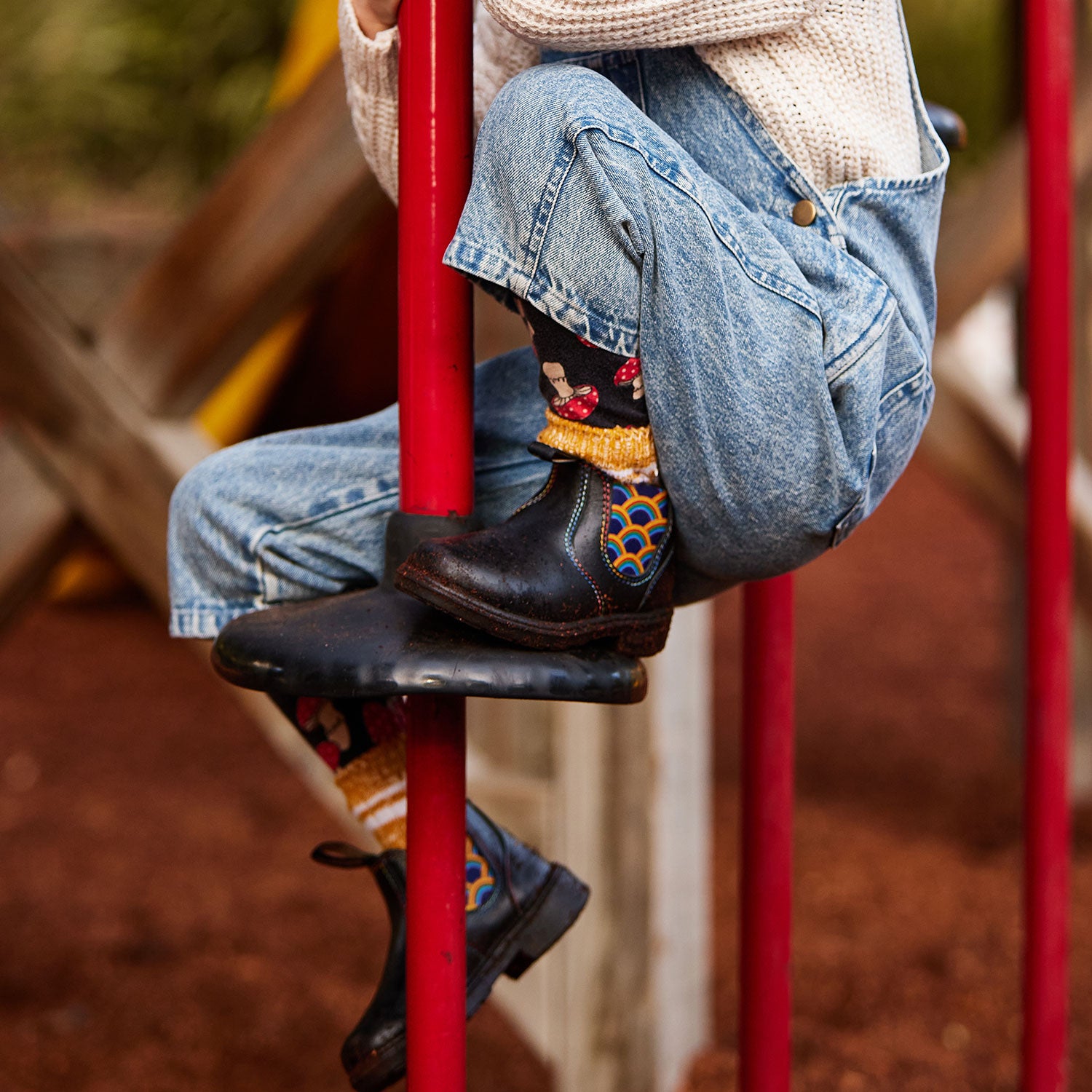 Blundstone 2254 Kids Black with Rainbow Elastic and Contrast Stitching on the playground