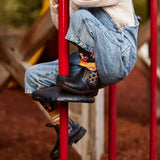 Blundstone 2254 Kids Black with Rainbow Elastic and Contrast Stitching on the playground